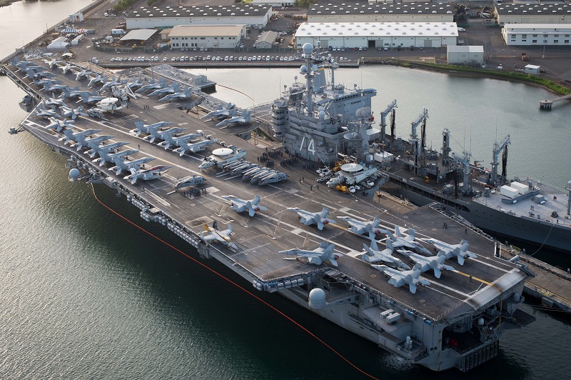 160701-N-SI773-100 JOINT BASE PEARL HARBOR-HICKHAM (July 1, 2016) An aerial view of the USS John C. Stennis (CVN 74) moored at Joint Base Pearl Harbor-Hickam for Rim of the Pacific 2016. Twenty-six nations, more than 40 ships and submarines, more than 200 aircraft, and 25,000 personnel are participating in RIMPAC from June 30 to Aug. 4, in and around the Hawaiian Islands and Southern California. The world's largest international maritime exercise, RIMPAC provides a unique training opportunity that helps participants foster and sustain the cooperative relationships that are critical to ensuring the safety of sea lanes and security on the world's oceans. RIMPAC 2016 is the 25th exercise in the series that began in 1971. (U.S. Navy Combat Camera photo by Mass Communication Specialist First Class Ace Rheaume/Released)